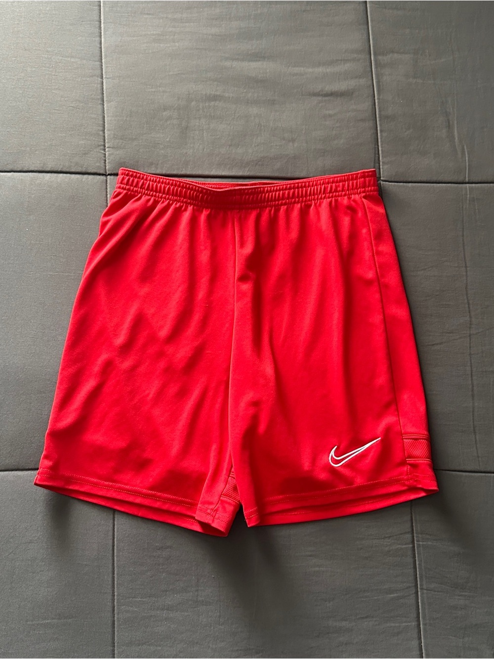 Nike Men’s Red Athletic Shorts with White Swoosh Accent